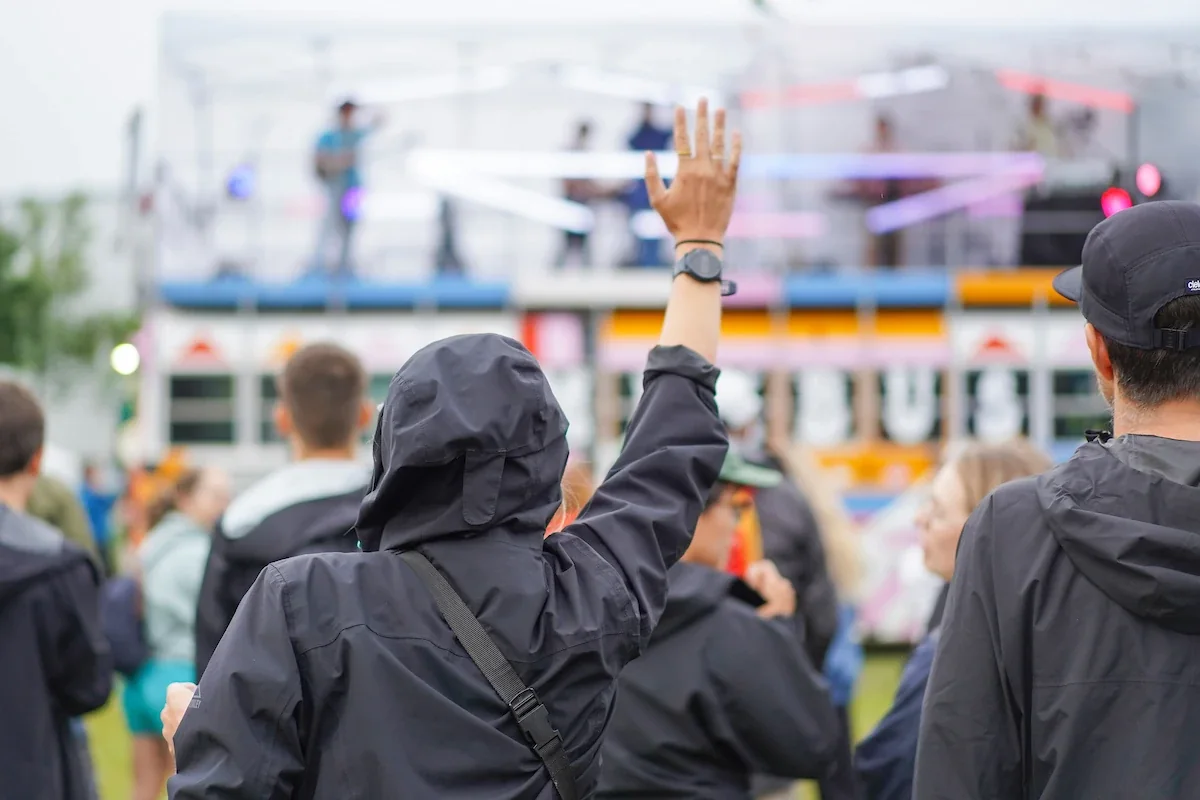 National Bank Open visitors wearing rain jackets during a weather delay
