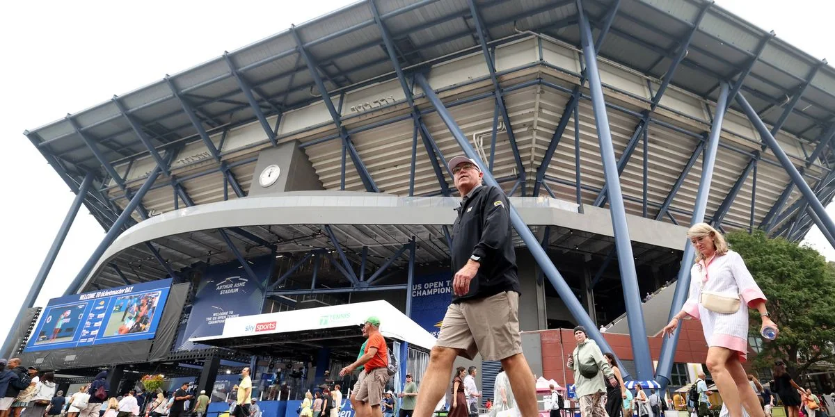 Fans walk outside Arthur Ashe Stadium at the 2026 US Open