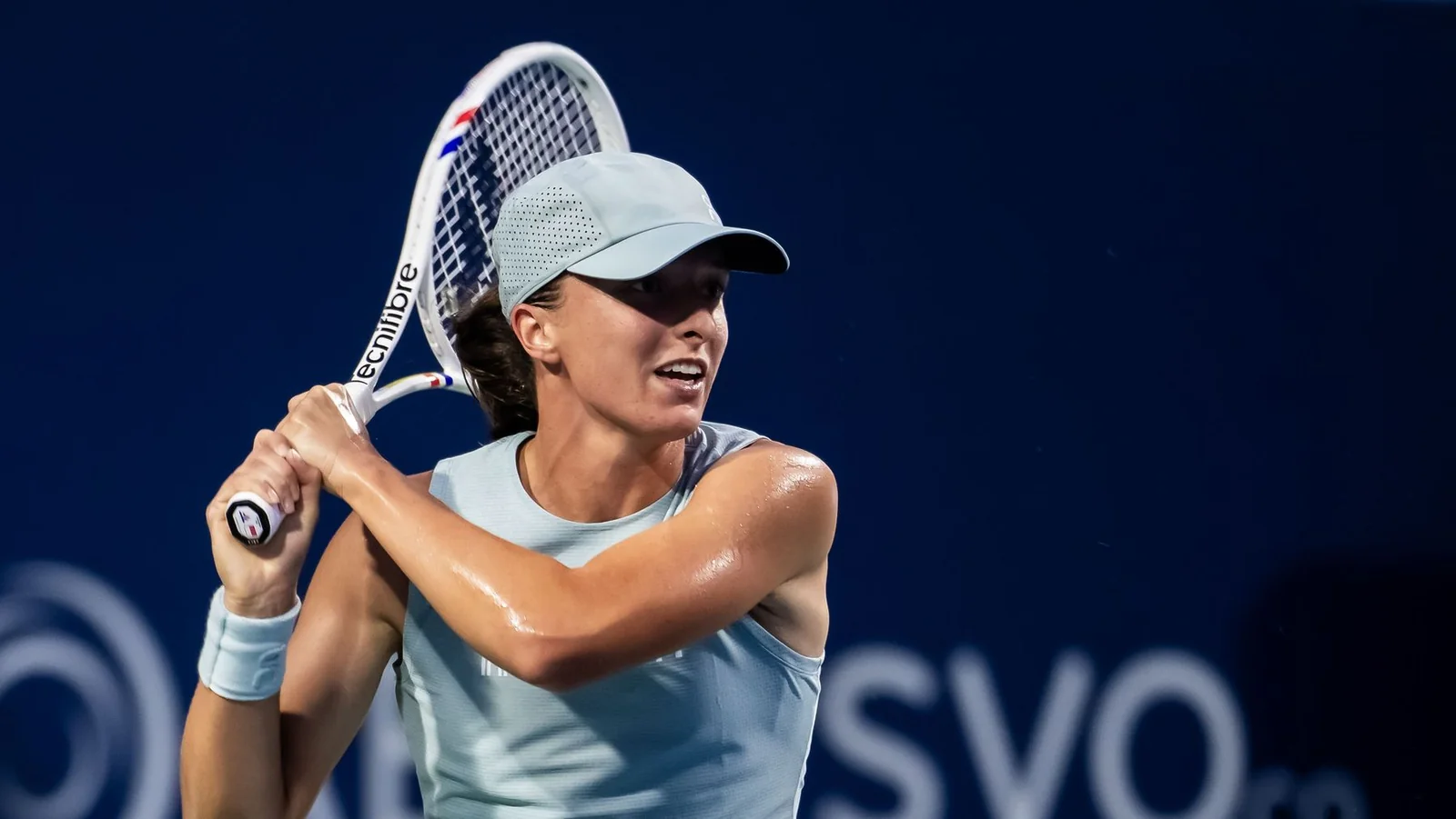 Iga Swiatek hits a backhand at the 2026 National Bank Open in Toronto